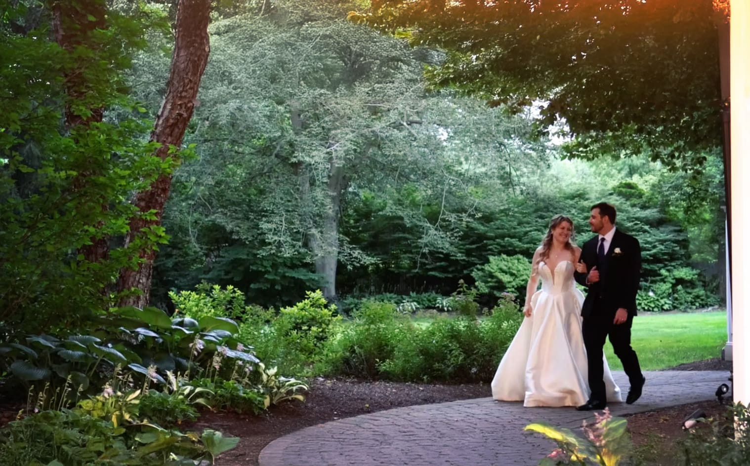 Bride and groom walking together at a Greenhouse Gazebo wedding in Basking Ridge, New Jersey